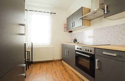 Fulda Apartamento | Living La Christal apartment with workspace & games