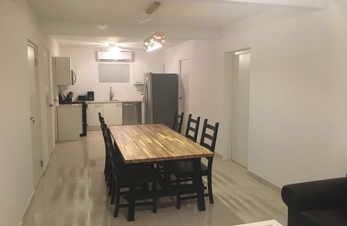 Sabana Liber Villapark Condominio | Nueva casa de 3 dormitorios y 2 baños con una gran piscina a minutos de Palm Beaches