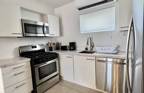 Sabana Liber Villapark Condominio | Nueva casa de 3 dormitorios y 2 baños con una gran piscina a minutos de Palm Beaches