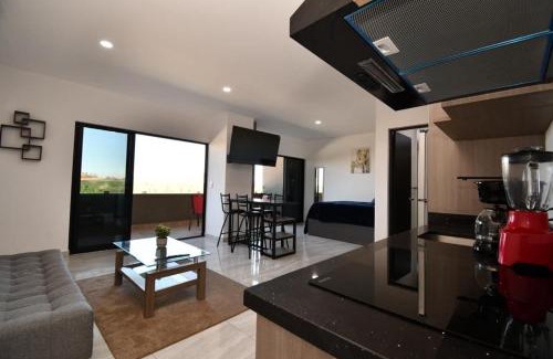 Villa Marina Apartamento | Loft de lujo con 9 albercas y vistas al campo de golf
