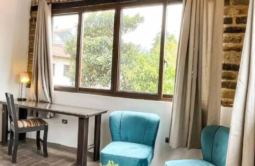 Antigua Guatemala Apartamento | Loft en las cercanías de Antigua con cocina, internet, Netflix, piscina y grill