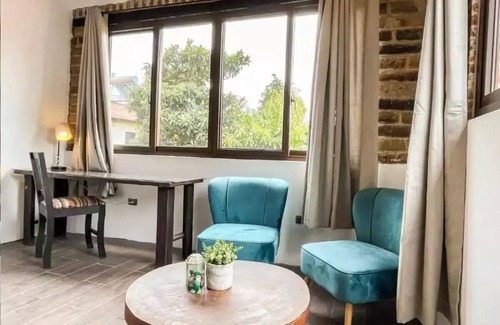 Antigua Guatemala Apartamento | Loft en las cercanías de Antigua con cocina, internet, Netflix, piscina y grill