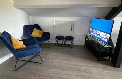 Wellingborough Apartamento | Loft studio apartment, BL, Town Centre, Secure gated parking option, Modern, fresh and spacious living, Netflix ready TV, Wifi