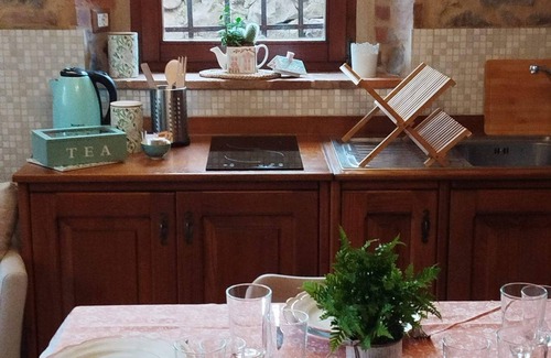 Radicofani Apartamento | Loft with flowered courtyard in Val d'Orcia Radicofani