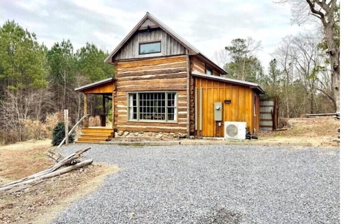 McCain Cabina | Log Cabin at Jordan Lake