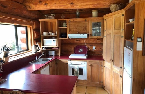 Port Levy Casa | Retiro de vacaciones en cabaña de troncos
