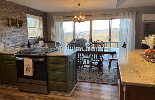 Frank Casa | Long range views. Sleeps 10! Hot tub, game tables and close to everything!