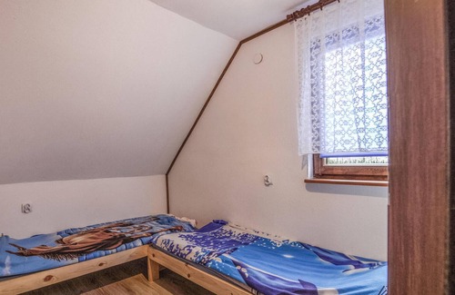 Natac Wielka Casa | Look forward to this pleasant holiday home on Lake Omulew.