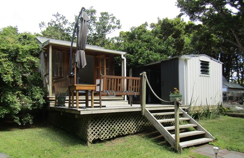Kaipara Flats Cabina | Looking for a glamping experience with a difference? Try the Magnolia Room.