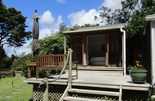 Kaipara Flats Cabina | Looking for a glamping experience with a difference? Try the Magnolia Room.