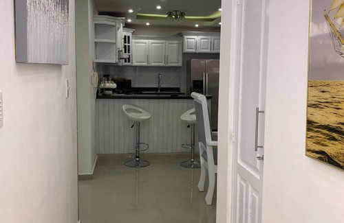 Gregorio Luperon Apartamento | Lovely and cozy home with pool and GYM. Located near major Bars and Restaurants