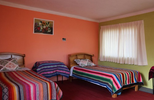 Huillanopampa Cama Y Desayuno | LoveLand Amantani Lodge - Un lugar encantado