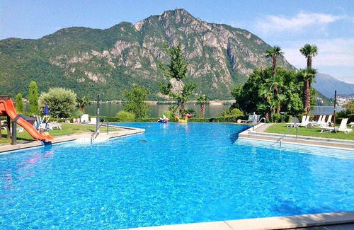 Bigogno Apartamento | Hermoso apartamento para 4 personas con A/C, WIFI, piscina, TV, vista panorámica y aparcamiento