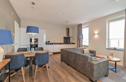 Colijnsplaat Apartamento | Lovely apartment for 4 people with hot tub, WIFI, TV, balcony and parking