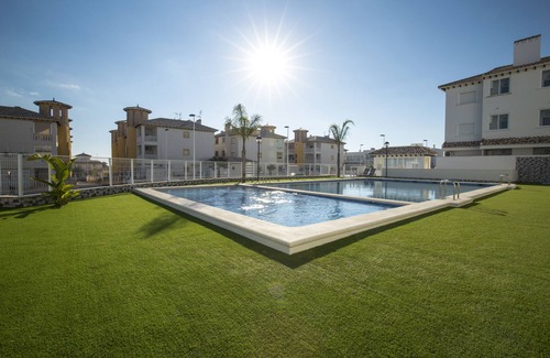 La Marina Apartamento | Precioso apartamento cerca de la playa, WIFI gratuito, garaje, piscina, aire acondicionado, terraza en la azotea