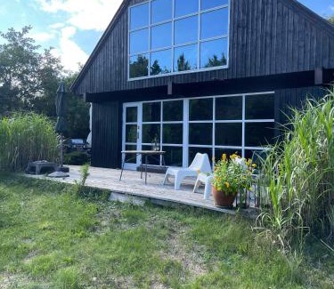 Øer Strand Casa | Lovely Beach Home Enveloped In Green Surroundings