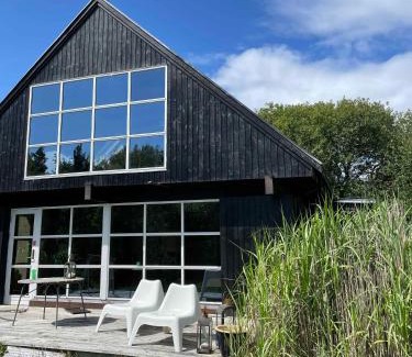 Øer Strand Casa | Lovely Beach Home Enveloped In Green Surroundings