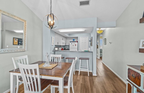 Avon Condominio | Lovely canal front condo with pool, kitchen, washer/dryer, TV, & board games