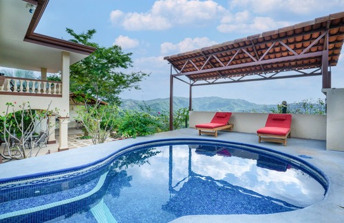 Coco Casa | Lovely home near the beach with pool, balcony, mountain view, & full kitchen