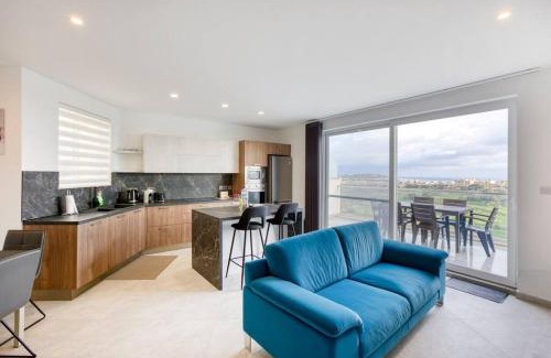 Xaghra Apartamento | Lovely home with beautiful view with communal pool by 360 Estates