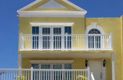 Orange Bay Casa | Encantadora casa moderna con vista al mar Caribe y a solo pasos de la playa