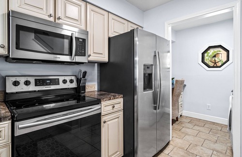 Lower Grand Lagoon Casa | Low, Low rental rates, but only a few steps to the beach - hurry before it gone!