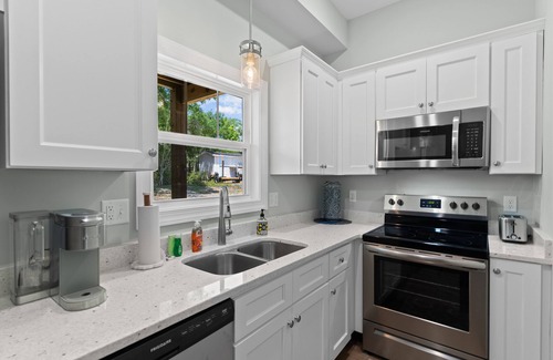 Supply Casa | Lower-level home with patio, grill, outdoor shower, streaming, central AC