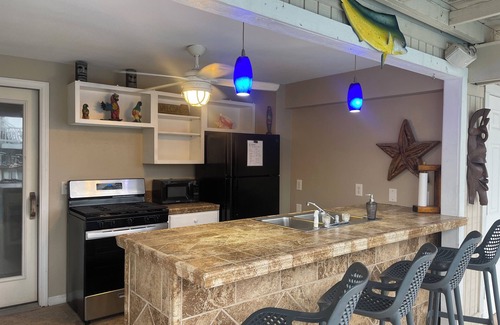 Jamaica Beach Casa | ¡Fantástico 7BR / 6BA con piscina, jacuzzi y pesca en 300 pies de agua!