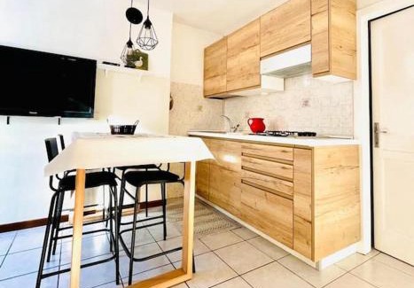 Carona Apartamento | Luminoso in centro paese