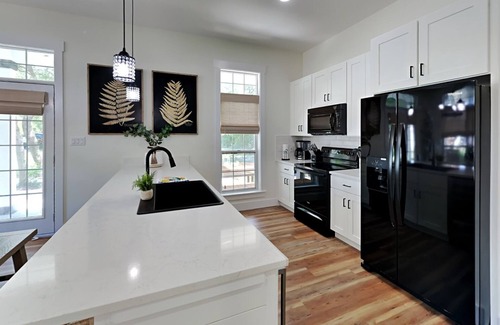 Sugarwood Beach Casa | Lush Pet-Friendly Home, Near Beach with Golf Cart, 4 Bikes