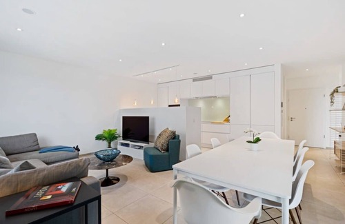 Gasperich Apartamento | Lux City Escape: 2BR Apt with Balcony & Workspace