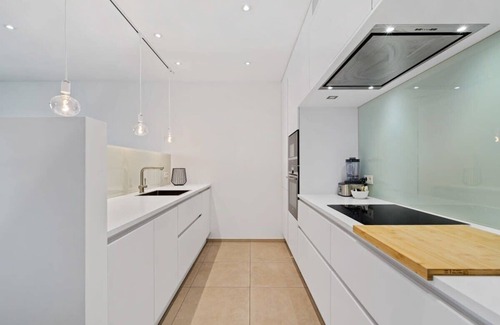 Gasperich Apartamento | Lux City Escape: 2BR Apt with Balcony & Workspace