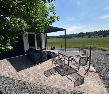 Papenvoort Chalet De Esquí | Luxe chalet met uniek vrij uitzicht op rustig park in Papenvoort DRENTHE