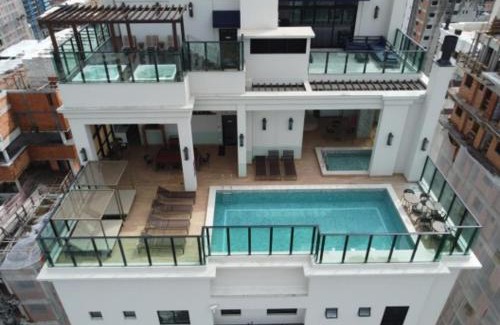 Morretes Apartamento | Luxuoso Apartamento com Rooftop Vista Mar, Piscina Aquecida e Ofurô