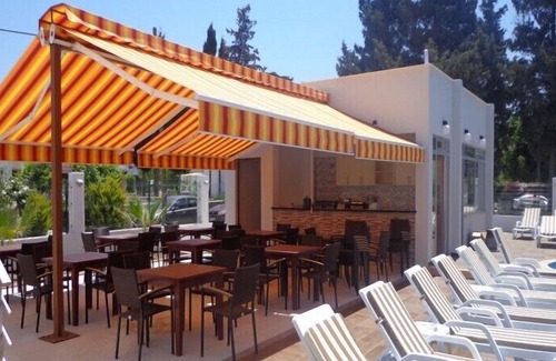Turgutreis Apartamento | Lujoso apartamento de 2 dormitorios en planta baja con piscina comunitaria.
