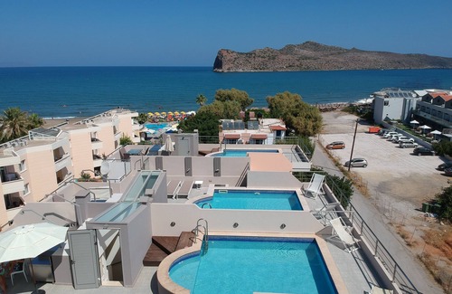 Agia Marina Villa | Luxurious 5-bedroom beachfront villa with a private rooftop pool and sea view