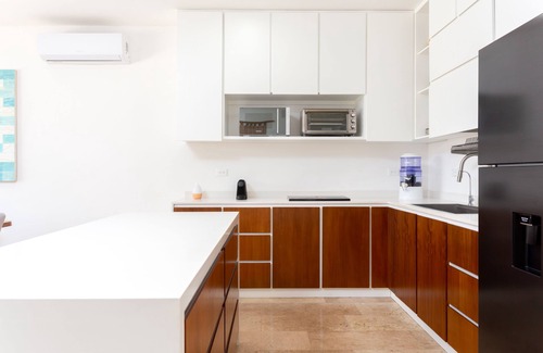 Puerto Aventuras Apartamento | Lujoso departamento con alberca ¡5 min de la playa!
