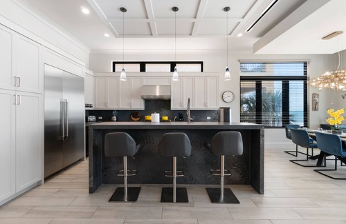 Mid Island Villa | Luxurious Beachfront Vacation Getaway | 4-Bedroom, 4.5-Bath w/ Heated Pool & Spa | Sleeps 12
