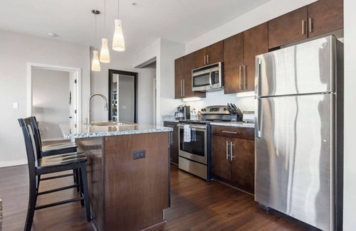 Rolling Mill Hill Condominio | Centro de lujo en la esquina de la unidad de 2 camas, 2 baños, vista a la ciudad y al río, unidad de la esquina, n. ° 220