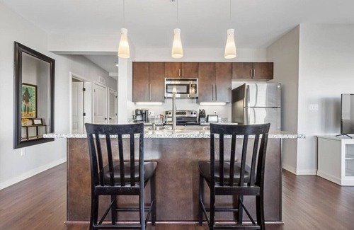 Rolling Mill Hill Condominio | Centro de lujo en la esquina de la unidad de 2 camas, 2 baños, vista a la ciudad y al río, unidad de la esquina, n. ° 220