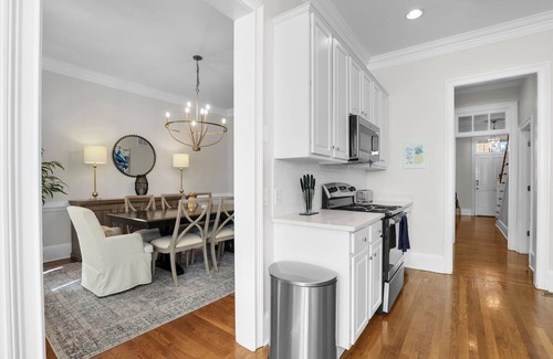 Hitch Village - Fred Wessels Homes Casa | Luxurious Home on Crawford Sq w/ Rooftop Deck + Parking by Lucky Savannah
