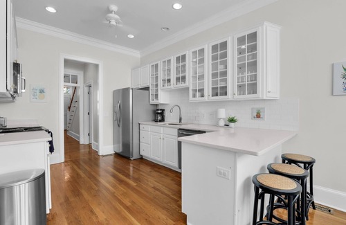 Hitch Village - Fred Wessels Homes Casa | Luxurious Home on Crawford Sq w/ Rooftop Deck + Parking by Lucky Savannah