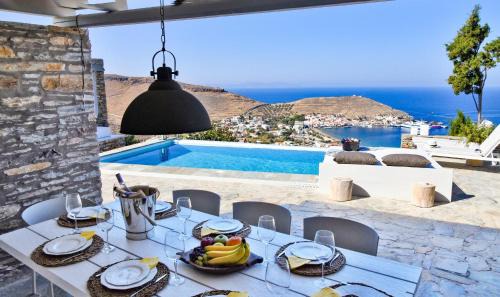 Korissia Villa | Luxurious & Stylish villa with a swimming pool, sea and sunset view.