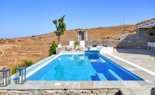 Korissia Villa | Luxurious & Stylish villa with a swimming pool, sea and sunset view.