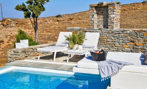 Korissia Villa | Luxurious & Stylish villa with a swimming pool, sea and sunset view.