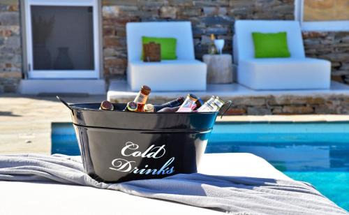 Korissia Villa | Luxurious & Stylish villa with a swimming pool, sea and sunset view.