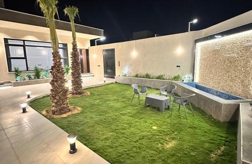 Al Qassim Chalet De Esquí | Luxurious villa with three bedrooms, cinema and swimming pool