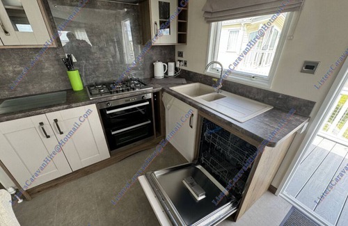 Porthcawl Casa | Luxury 2 bedroom family caravan, with decking and close to the beach.