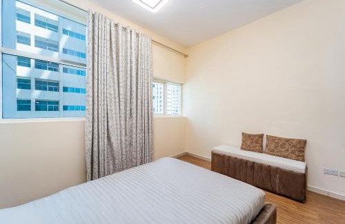 Ajman Apartamento | Luxury 2 bedroom next to beach with swimming pool gym and kids play area