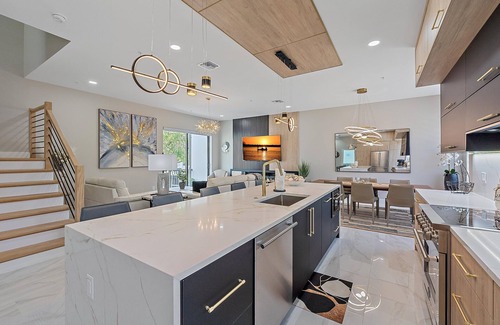 Downtown Casa | Luxury 3BR Townhouse w/Elevator & Rooftop | Walk to Downtown